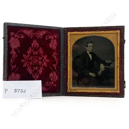 Ambrotype – seated youth with gloves,